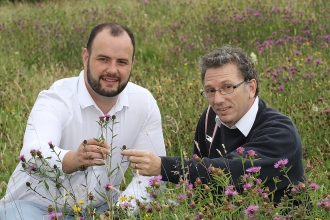 Hilltop Honey owner Scott Davies (left) with MWT’s CEO Clive Faulkner at one of the nature reserve hives