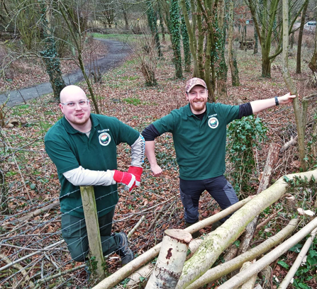 Two volunteers from the Friends of Severn Farm Pond group